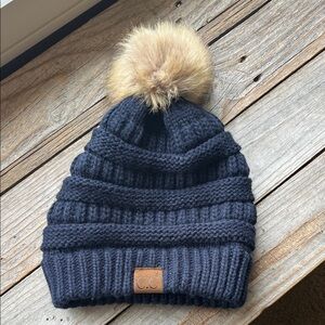 CHANEL Kids Navy Knit Beanie with Tan Pom Pom